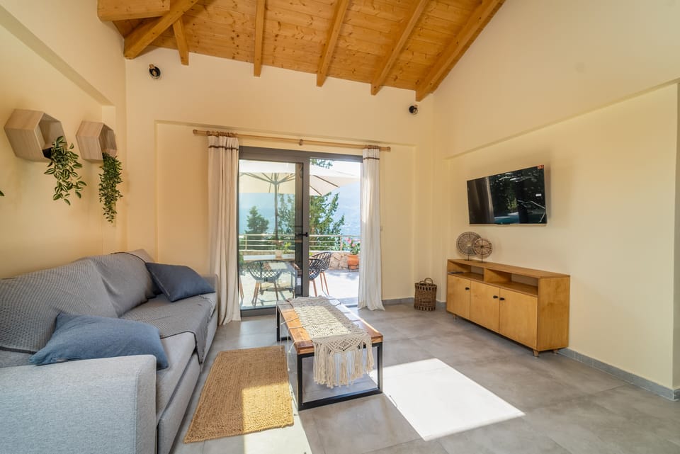 Open plan kitchen - living area with a 43' smart TV