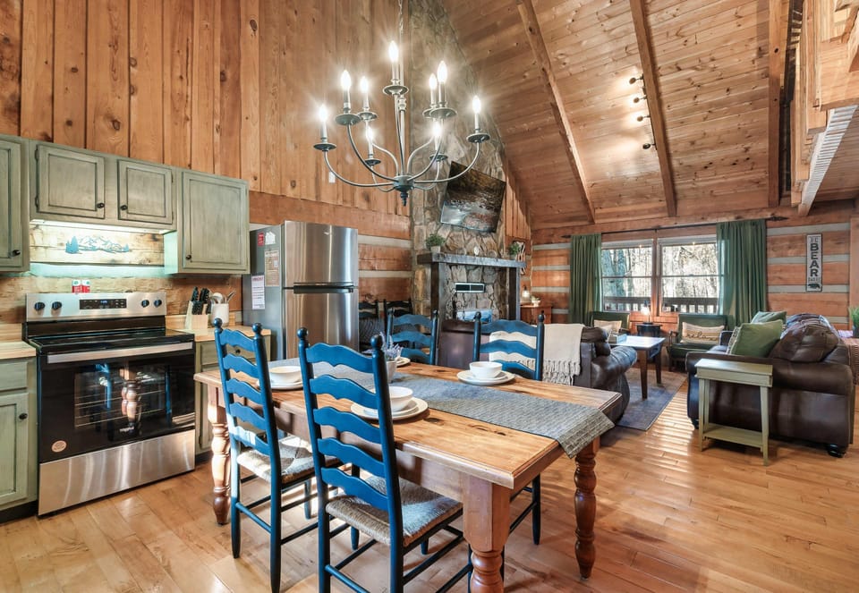 Dining Room: Gather around the rustic table for unforgettable meals