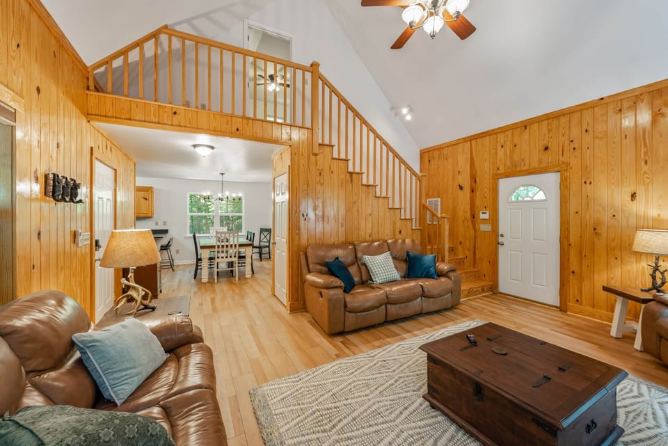 Comfortable open living spaces. Stairs up to second bedroom.