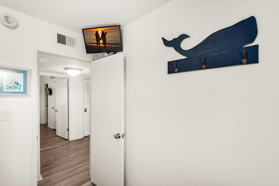 Bunk room with flat screen TV