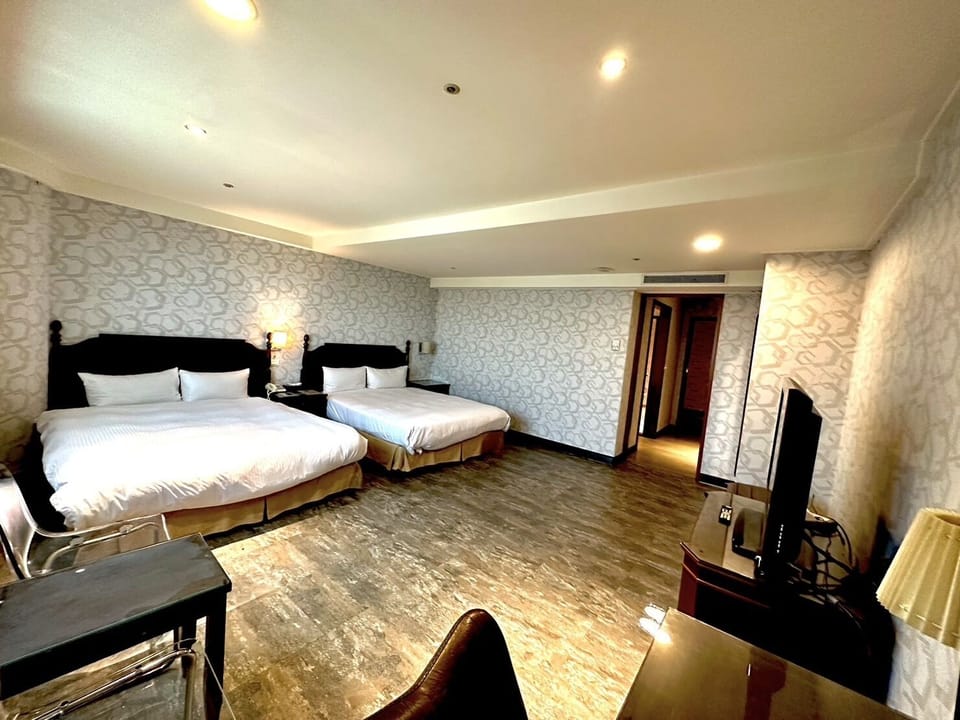 Classic Quadruple Room | Down comforters, minibar, laptop workspace, soundproofing