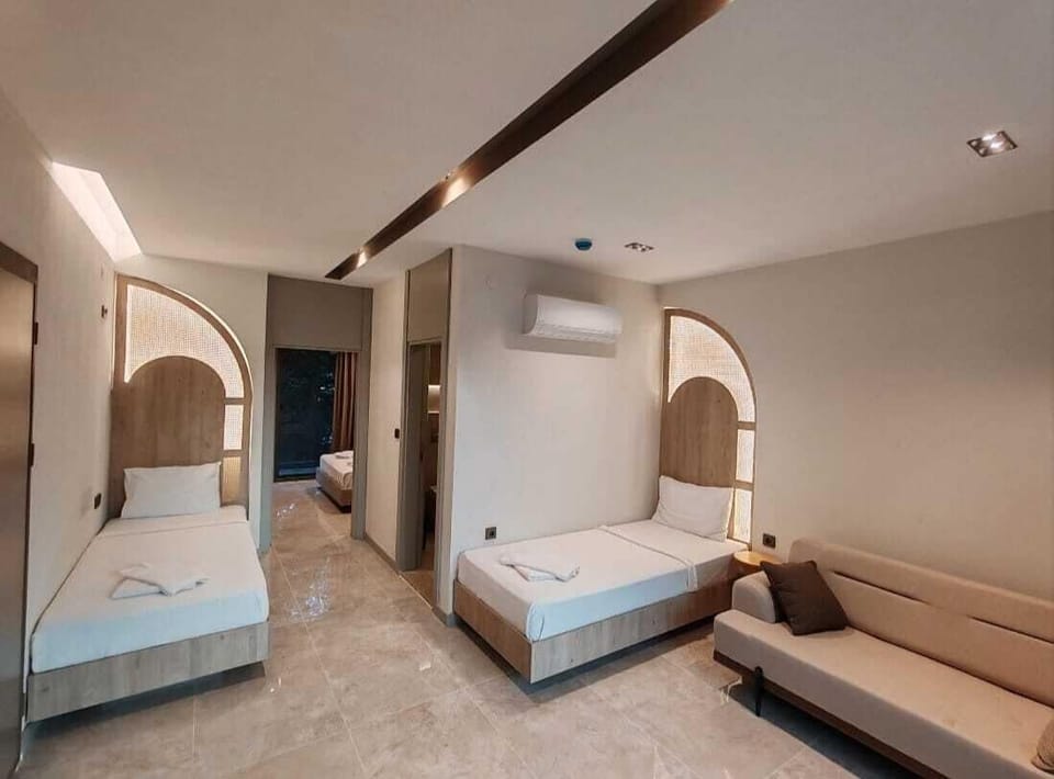 Family Suite, Garden View | WiFi (free), bed sheets