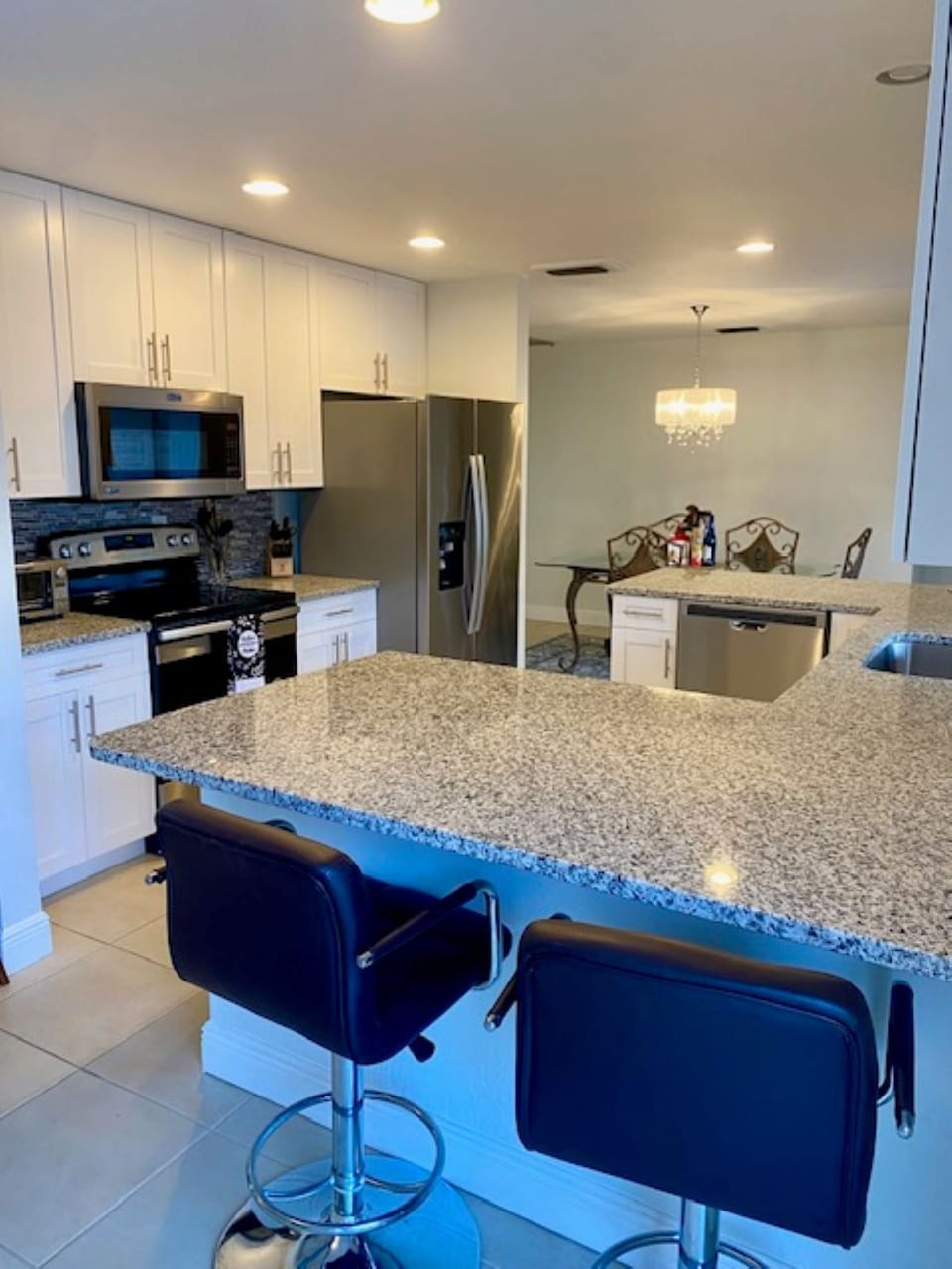 Kitchen with all new appliances and granite