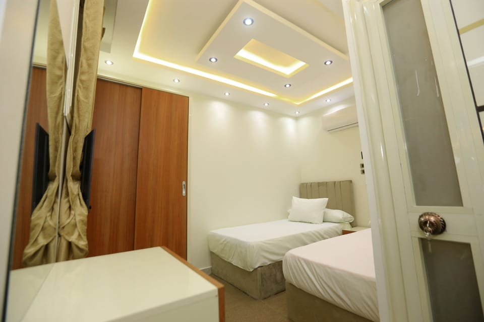 Blackout drapes, soundproofing, iron/ironing board, WiFi (free)