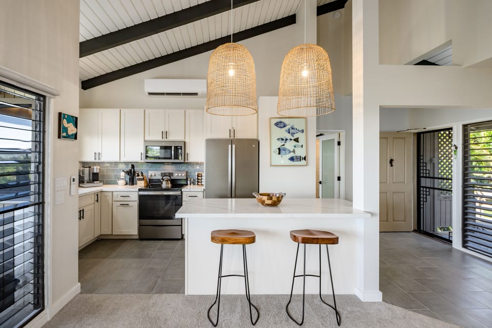 Luxury Condo | Private kitchen | Full-size fridge, microwave, oven, stovetop