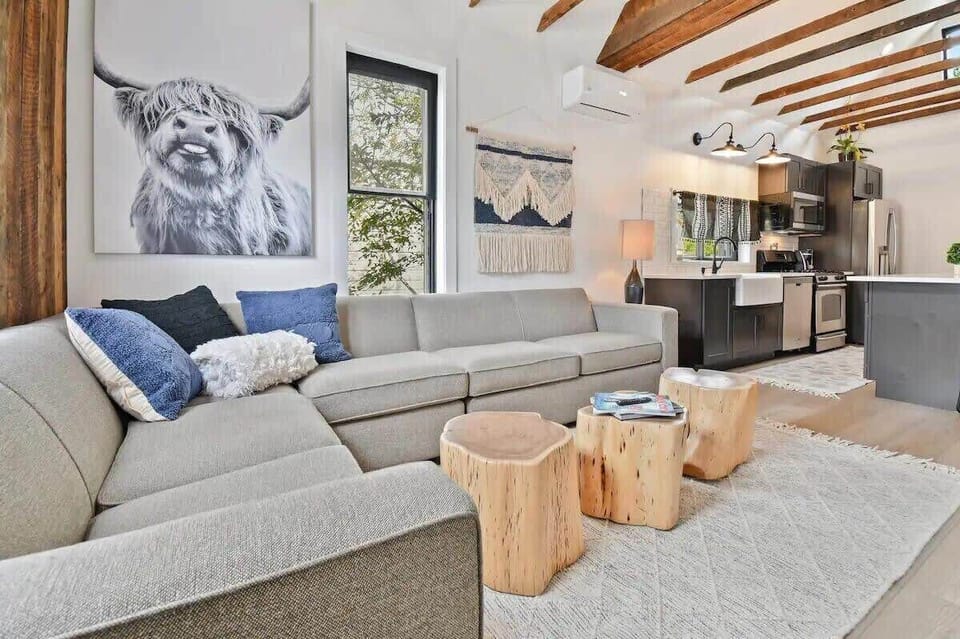 The well-decorated living room is a warm and inviting place perfect for relaxing with loved ones after a busy day.