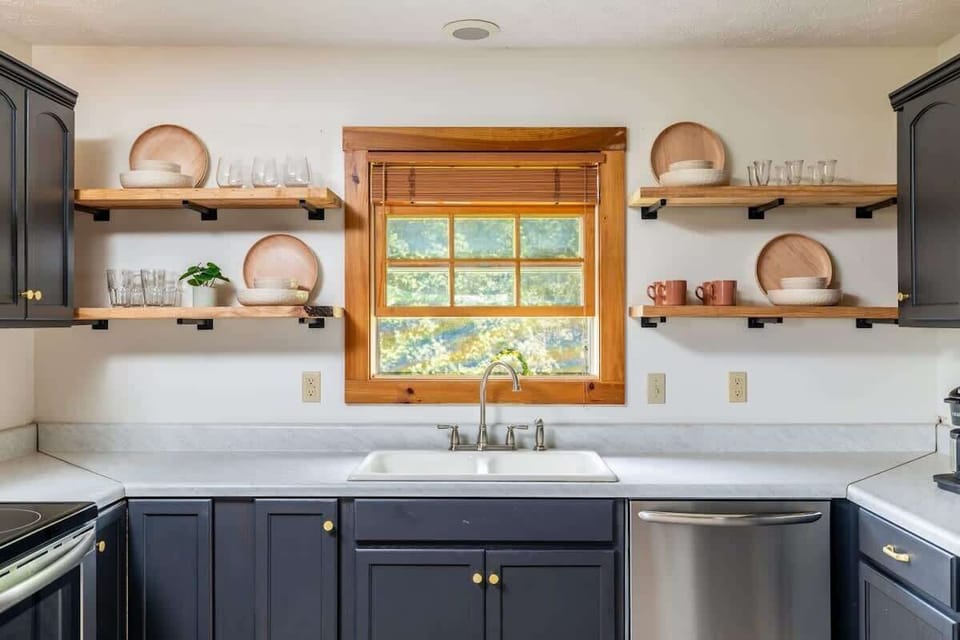Upstairs, Just off of the dining room you will have a fully stocked kitchen ready to help you serve your crew.