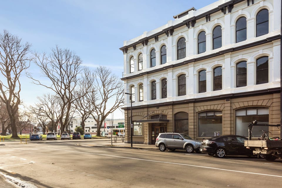 1 Vogel Street building with queens gardens across the road