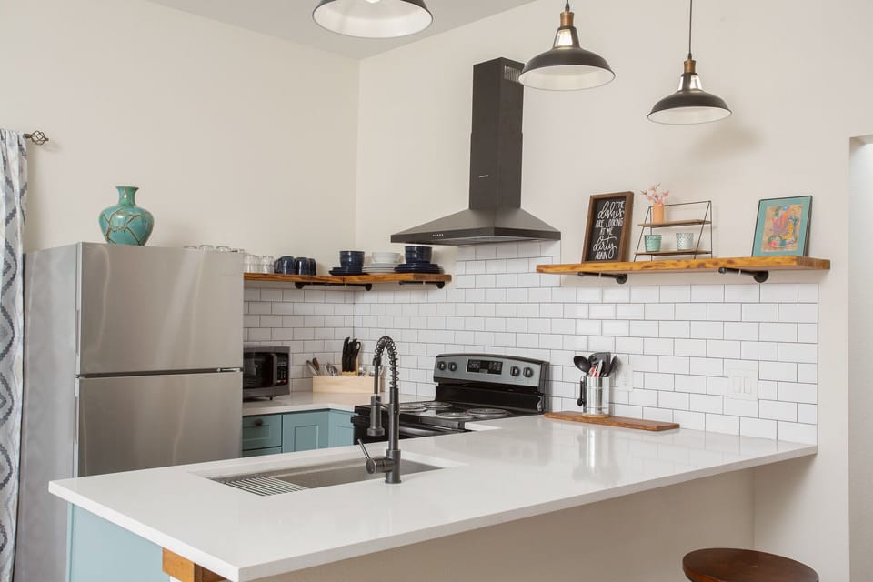 Experience the joy of cooking in our beautifully designed kitchen,
