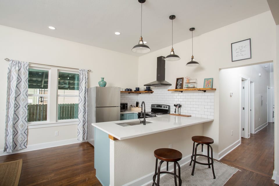 Experience the joy of cooking in our beautifully designed kitchen,