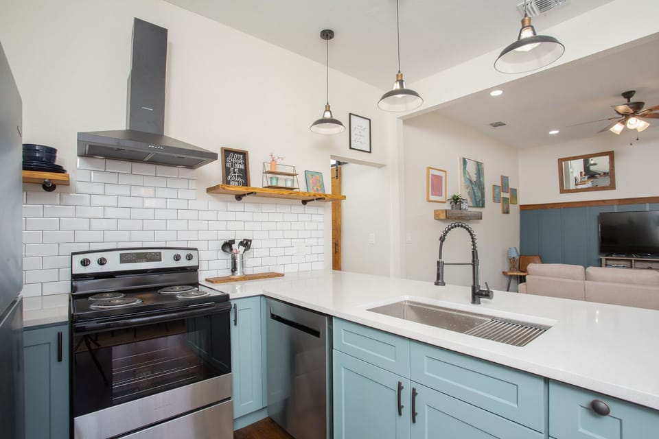 Experience the joy of cooking in our beautifully designed kitchen,