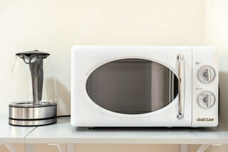 Comfort Apartment | Microwave