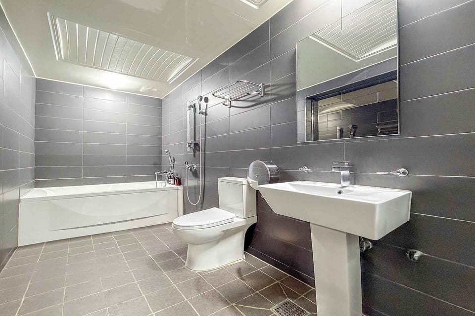 Premier Double + Casual Breakfast | Bathroom | Shower, designer toiletries, hair dryer, bathrobes