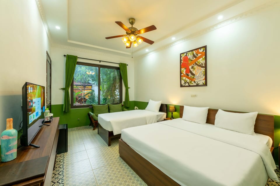 Deluxe Triple Room | Premium bedding, minibar, desk, blackout drapes