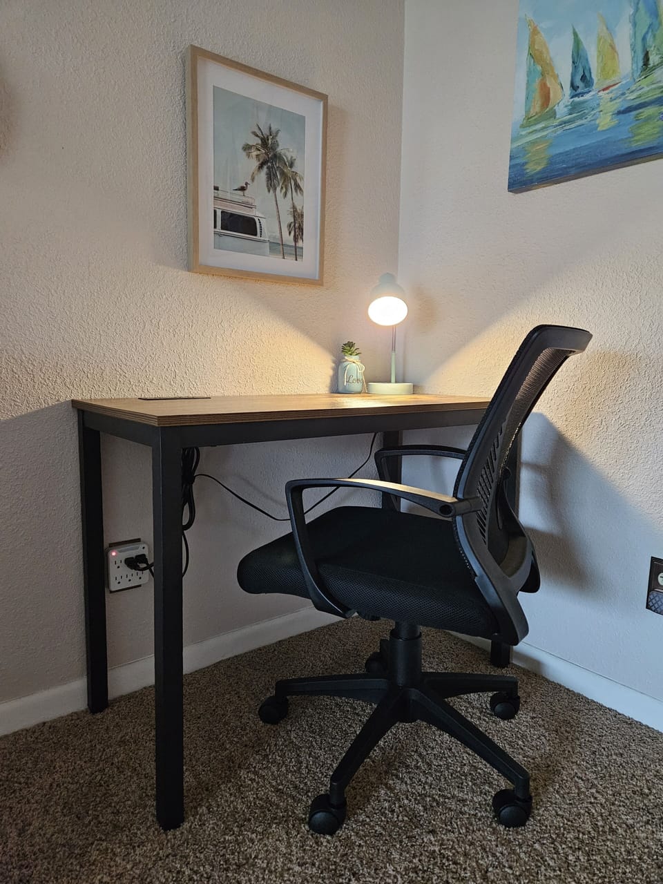 Computer desk  with charging  ports and plug-ins.

