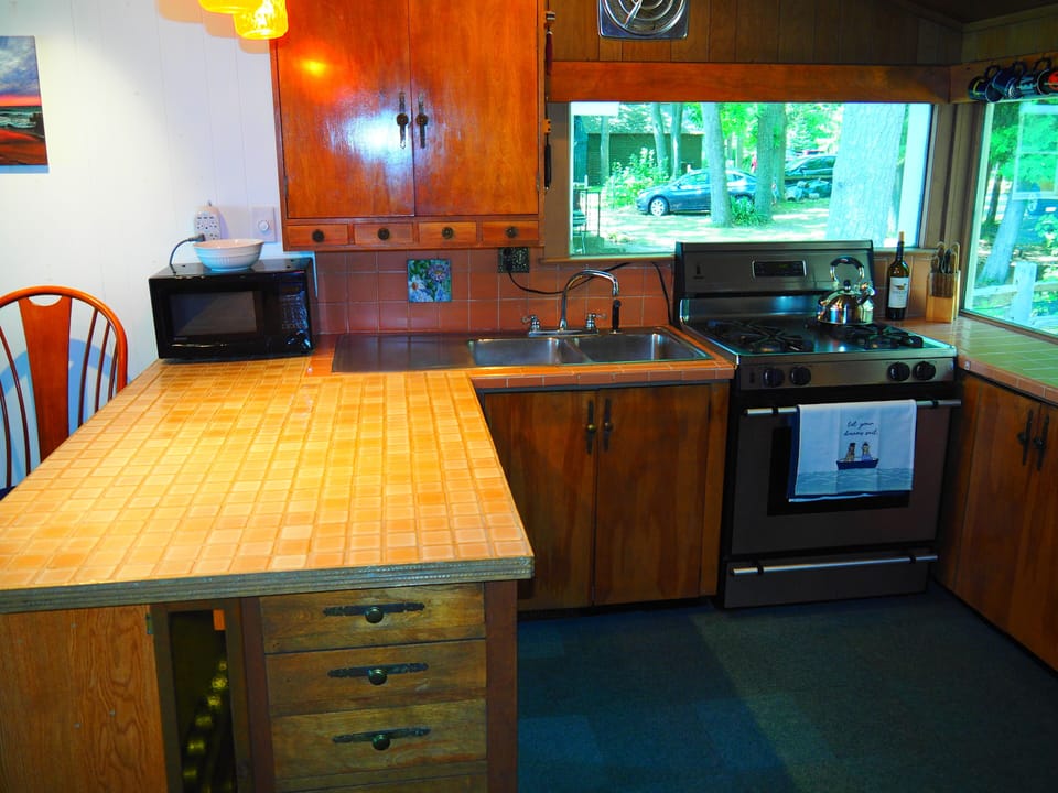 KITCHEN:  All appliances and a good supply of cooking and dining utensils.