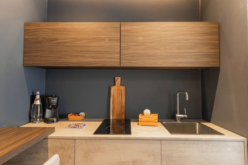Junior Studio Suite | Private kitchen | Fridge, espresso maker, coffee/tea maker, cleaning supplies