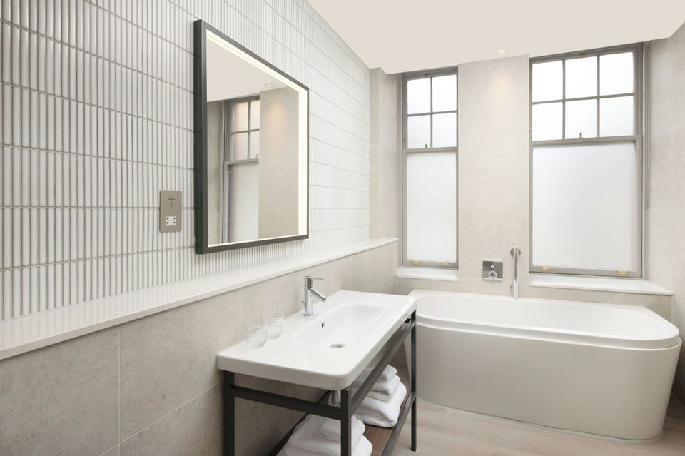 Hair dryer, towels, soap, shampoo