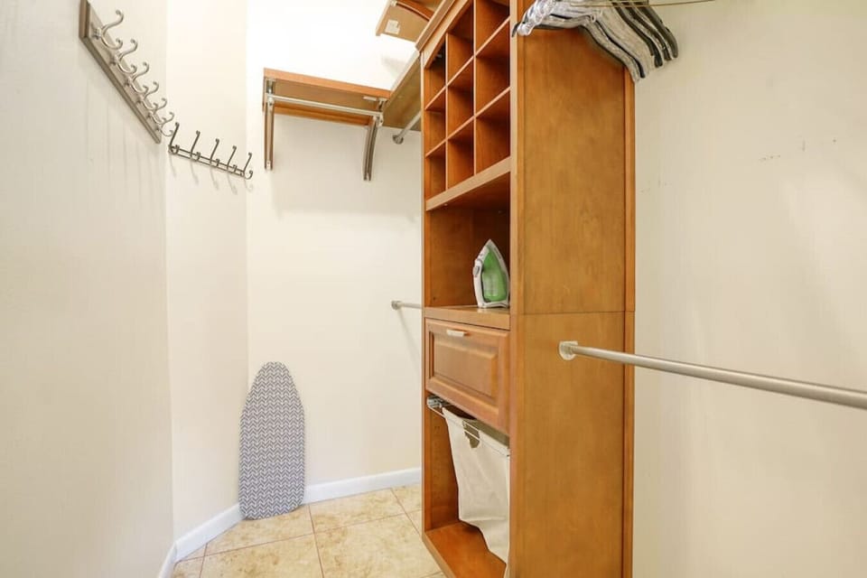 Spacious Wardrobe Haven: Step into our large walk-in closet