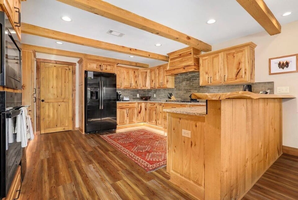 Directly ahead, you'll see our kitchen.
