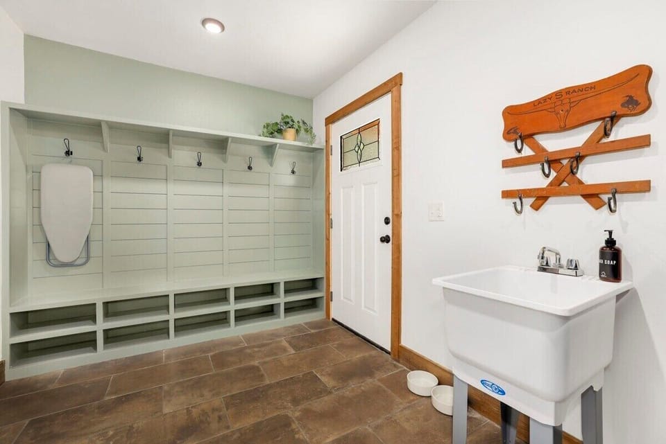 The area also has hooks and storage available.