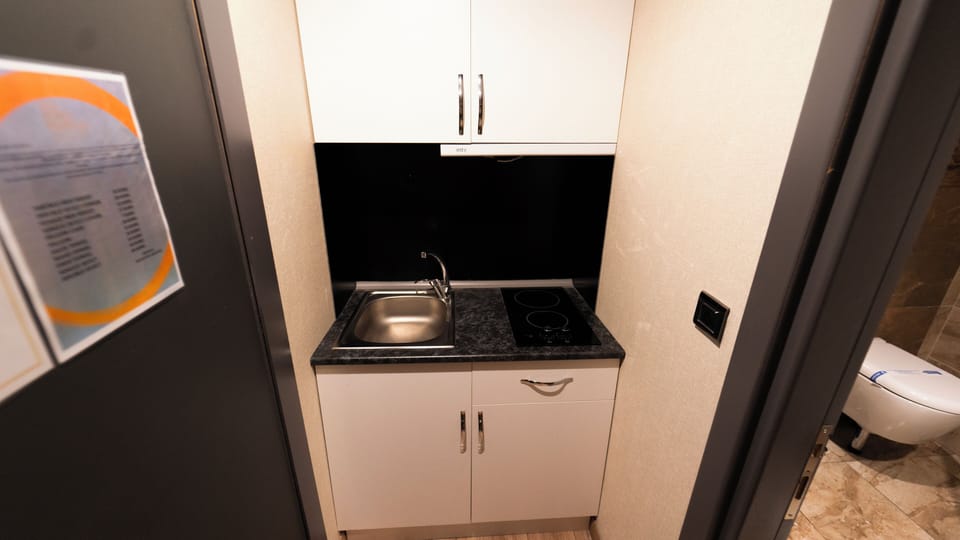 Presidential Suite | Private kitchen | Mini-fridge, electric kettle