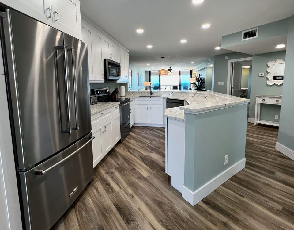 Another angle of the completely remodeled kitchen- this side ove - Another angle of the completely remodeled kitchen- this side overlooks the beach and Gulf of Mexico.