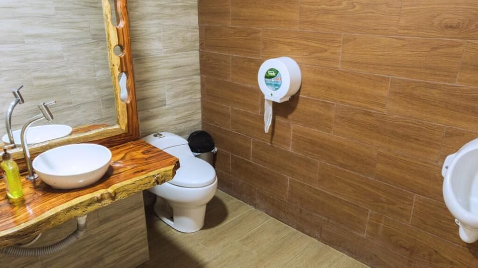 Deluxe Double Room | Bathroom | Combined shower/tub, rainfall showerhead, towels, soap