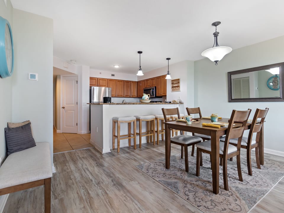 Your open-concept living space flows seamlessly from kitchen to dining, perfect for gathering and creating memories together.