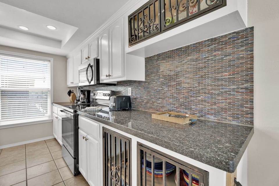 Condo, 2 Bedrooms | Private kitchen | Coffee/tea maker, fridge, oven, toaster