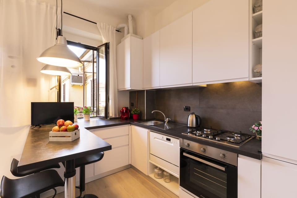 Design Apartment | Private kitchen | Full-size fridge, microwave, oven, stovetop