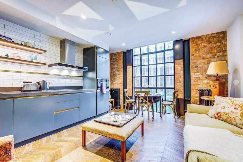 Open plan living/kitchen and dining area with plenty of space to sit down and relax after a hard day at work or exploring the city of London.