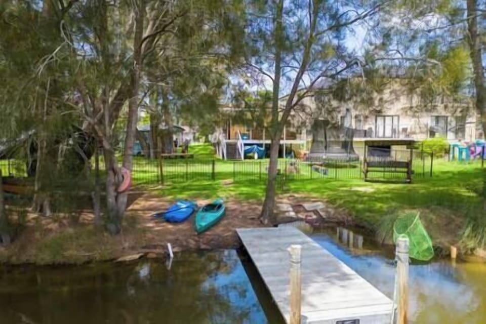 Looking from the creek into the backyard of the house