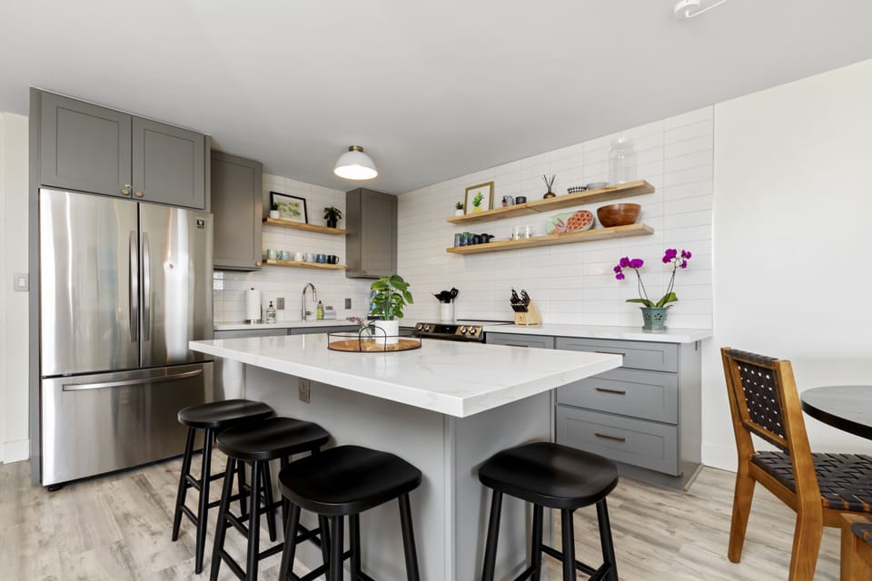 Luxury Condo | Private kitchen | Full-size fridge, microwave, oven, dishwasher