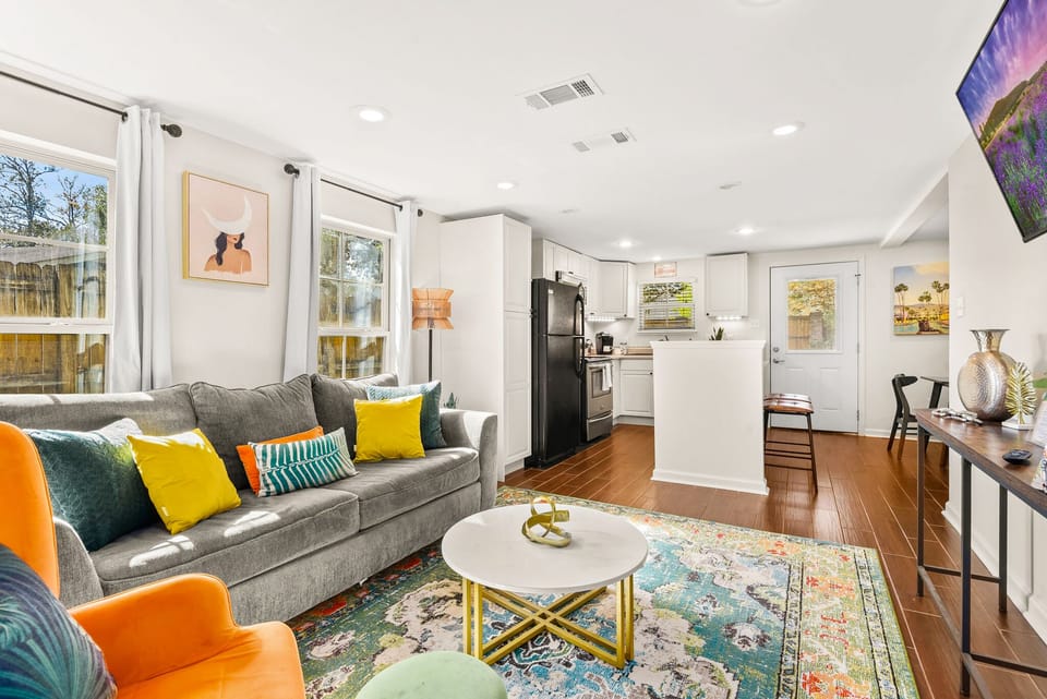 Spacious living room and kitchen for the family to enjoy watching movies or cooking a nice meal.