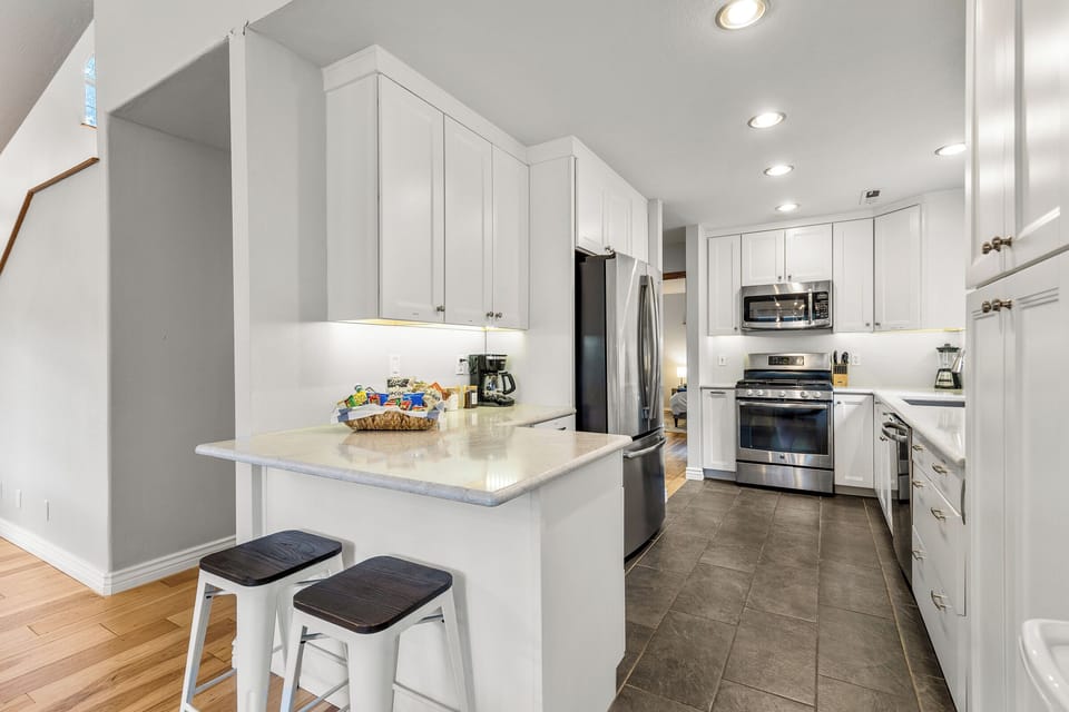 Open Kitchen with Bar Stools, Coffee Maker, Blender & Other amenities