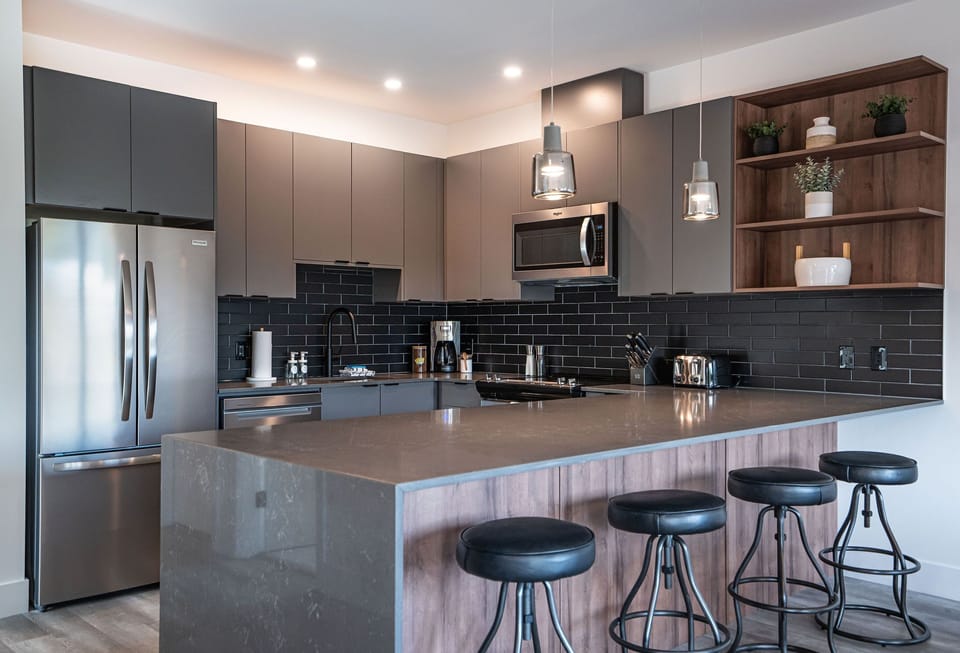 Condo | Private kitchen | Coffee/tea maker, full-size fridge, microwave, oven