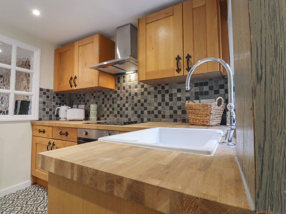Fridge, electric kettle, toaster, cookware/dishes/utensils