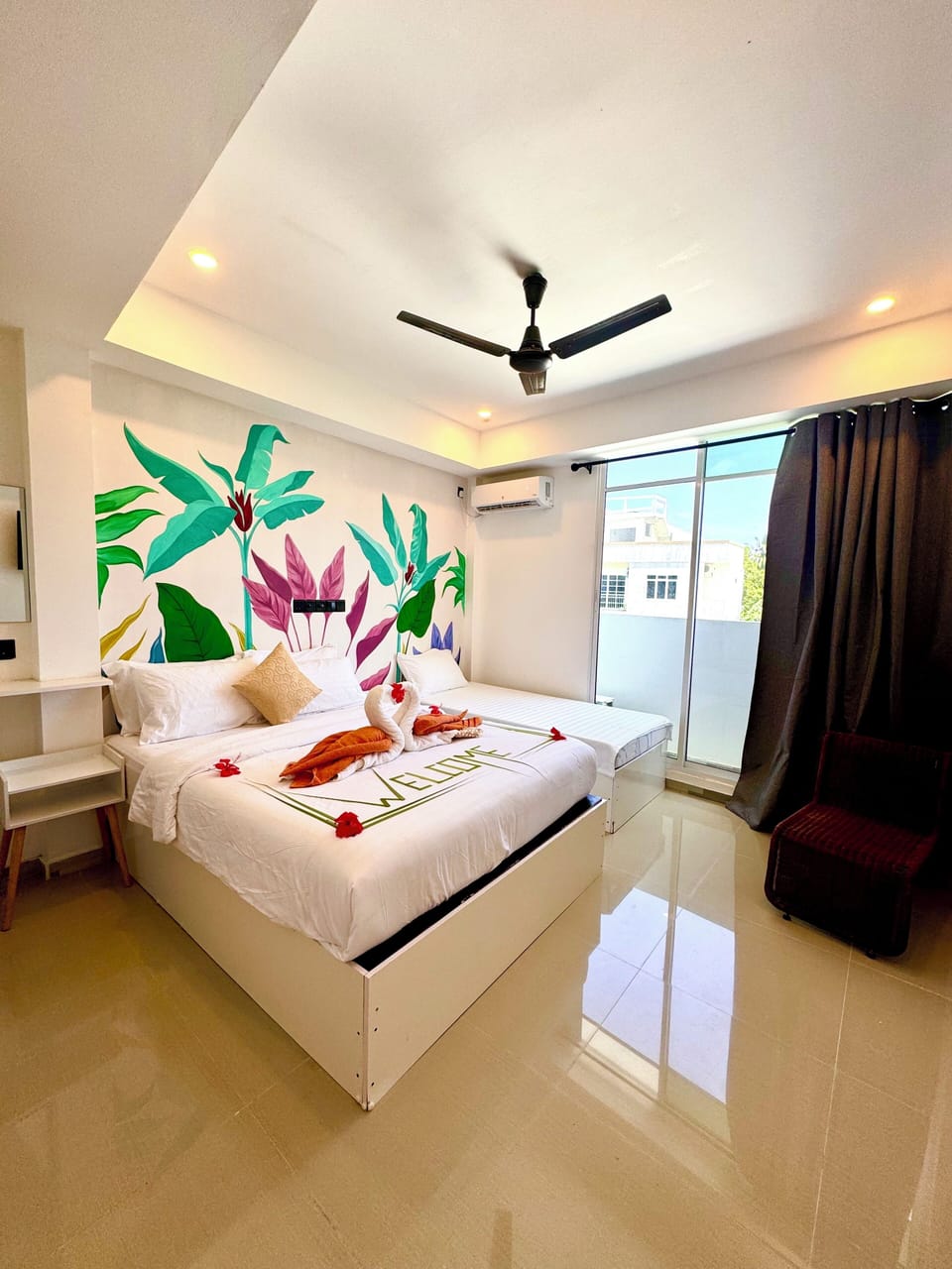 Deluxe Room, Balcony | Minibar, individually decorated, desk, blackout drapes