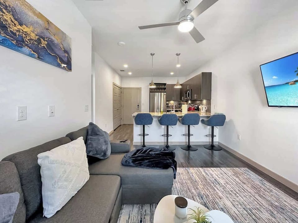 Beautifully Designed Spacious living Room with Sofa Bed and Pool View Balcony