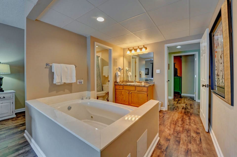 In your primary suite you have a large jacuzzi tub.