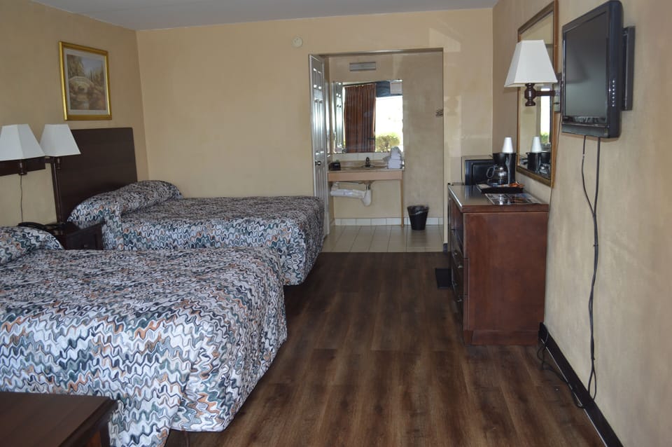Standard Room, 2 Double Beds, Non Smoking | WiFi (free), bed sheets