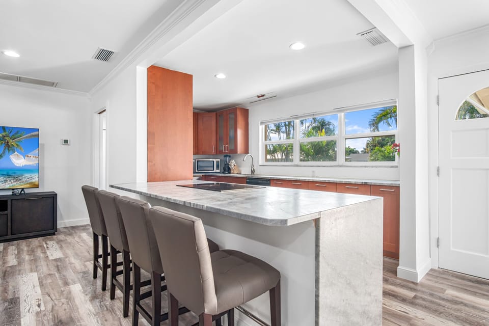 From the kitchen on, the area opens into a spacious living room 