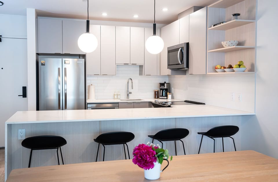 Condo | Private kitchen | Coffee/tea maker, full-size fridge, microwave, oven