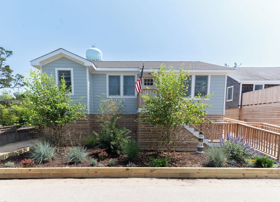Front of house - close to beach and town. Easy access ramp up to pool deck.
