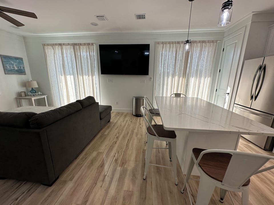 Living room/kitchen area.