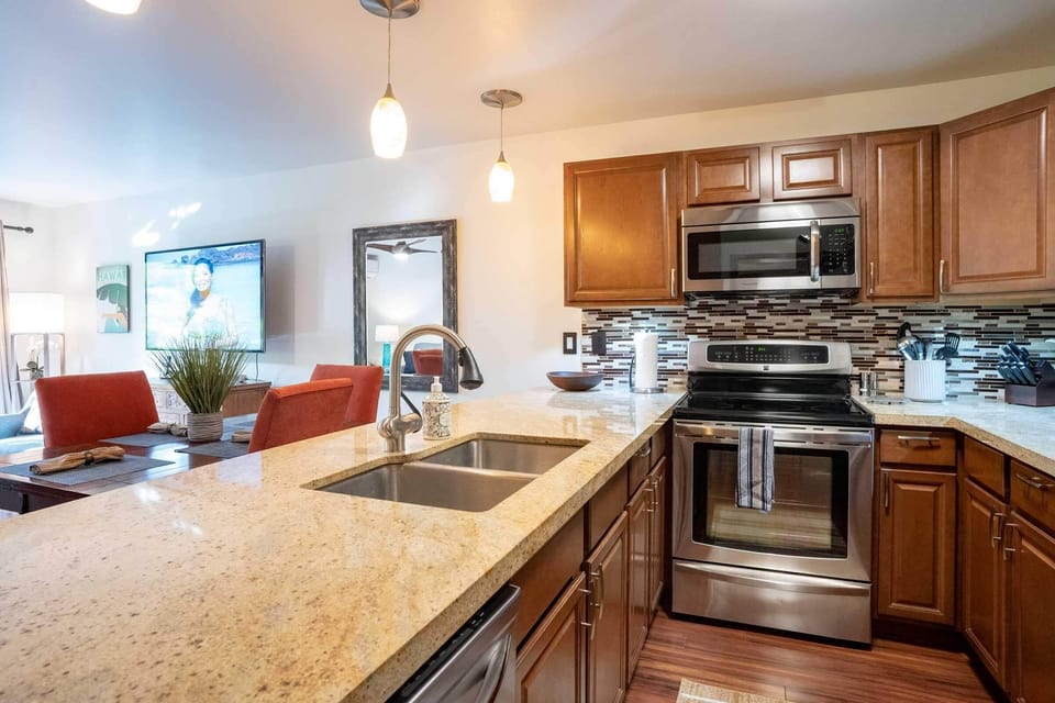 Luxury Condo | Private kitchen | Full-size fridge, oven, stovetop, dishwasher