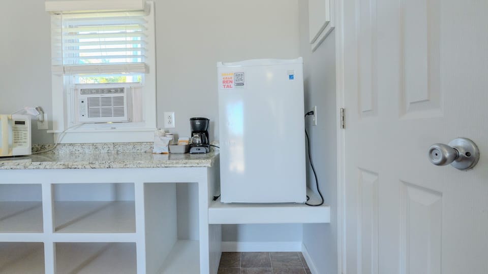 Microwave, Coffee Pot and Mini Fridge