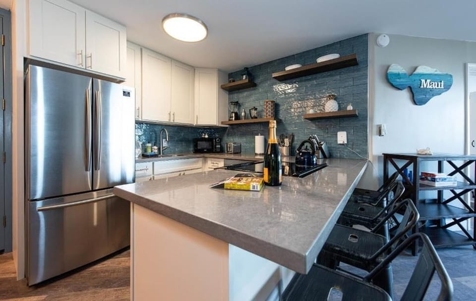 Luxury Condo | Private kitchen | Full-size fridge, microwave, oven, stovetop