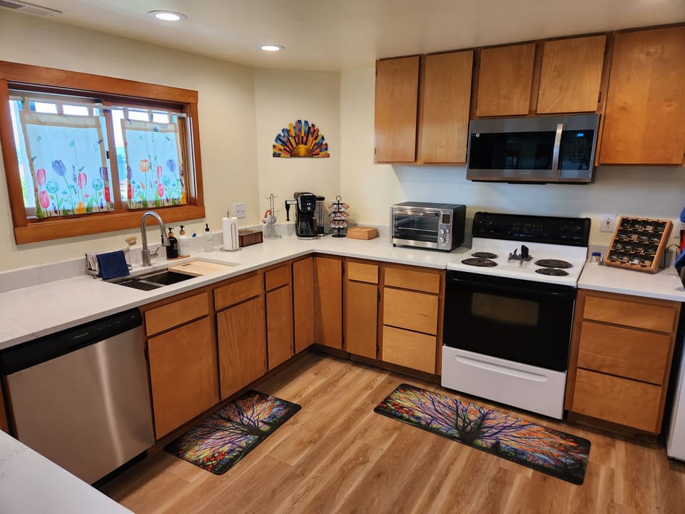Full size stove and microwave plus convection / air-fryer / toaster oven.